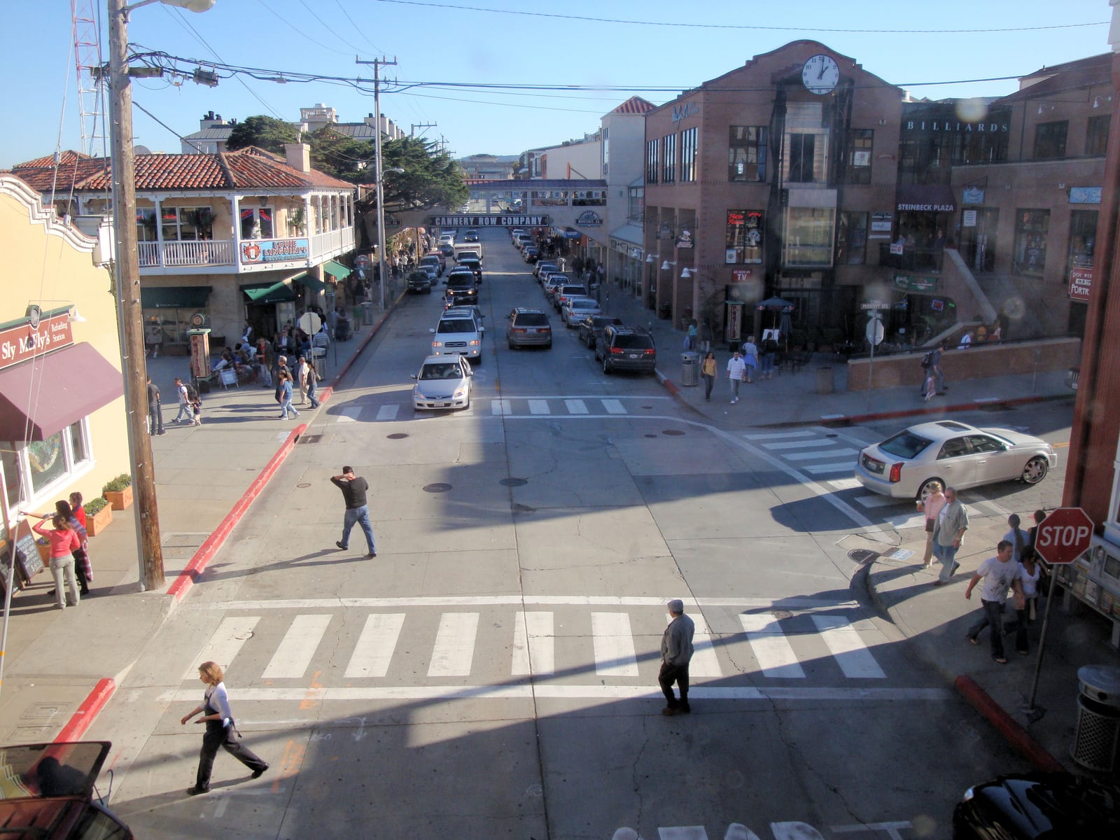 Shops and the Cannery Row Company sign along Cannery Row in Monterey, California